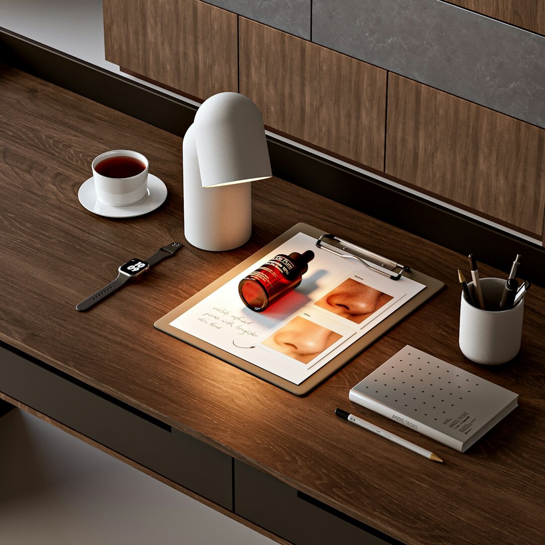 Swiss man in his fifties writing advertising copy at a wooden desk